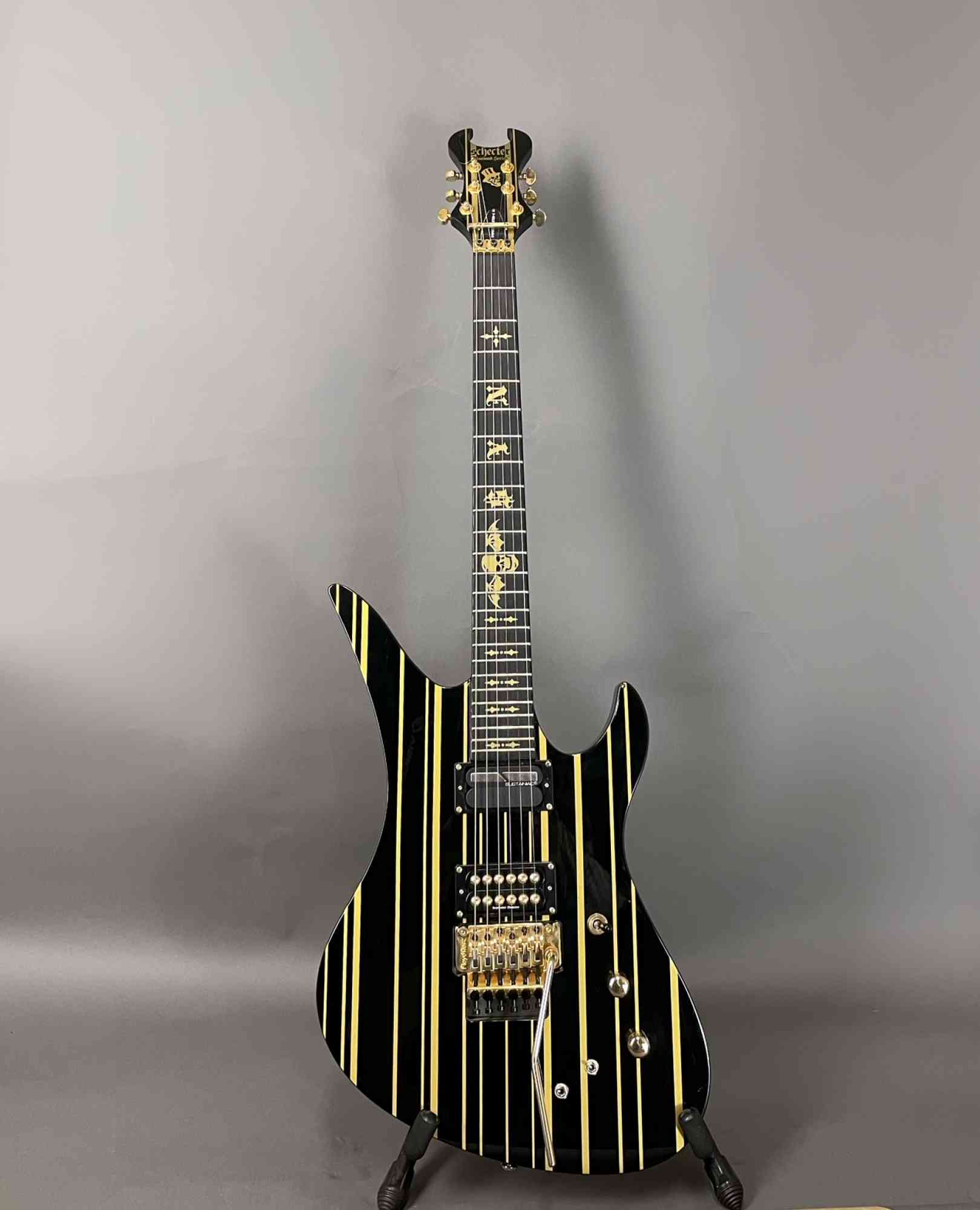 Schecter Synster Custom-S  Black with Gold Stripes. Click to enlarge